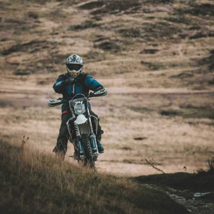 man riding on motorcycle